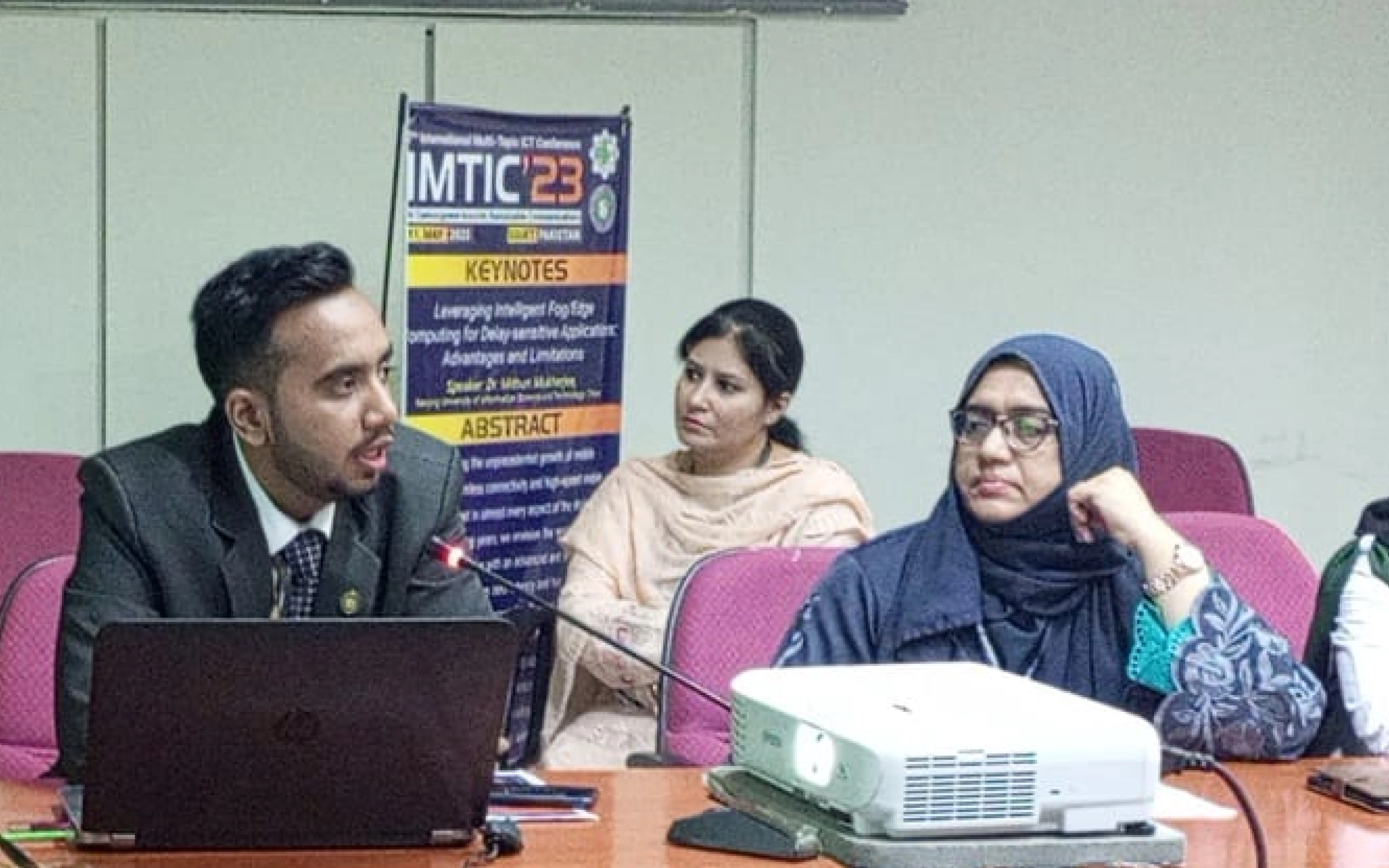 IMTIC'23 Conference - AI Engineer Huzaifa, Huzaifa Shahbaz, M. Huzaifa, Muhammad Huzaifa Shahbaz, mhuzaifa, mhuzaifadev speaking at Mehran University